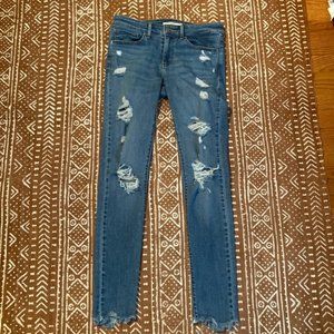 Levi’s 711 Skinny distressed jean